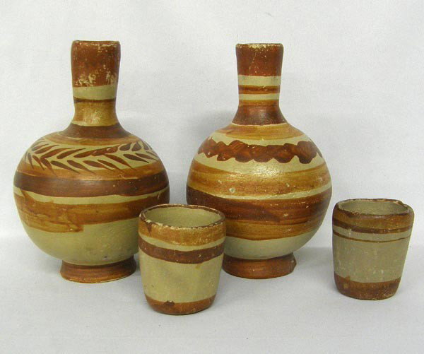Pair Mexican Pottery Bedside Water Jugs with Cups: Pair Mexican Pottery Bedside Water Jugs with Cups. Some chips and wear. Measures approx 8''Hx5''W. Buyers Pay Actual Shipping and Handling Charges(see terms and conditions for more information).