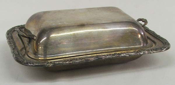 Old English Reproduction Silverplate Butter Dish: Old English Reproduction Silverplate Butter Dish. Has stamped on back: Old English Reproduction, 42. Measures approx. 3''H x 9''L x 6 3/4''W. Buyers Pay Actual Shipping and Handling Charges(see terms