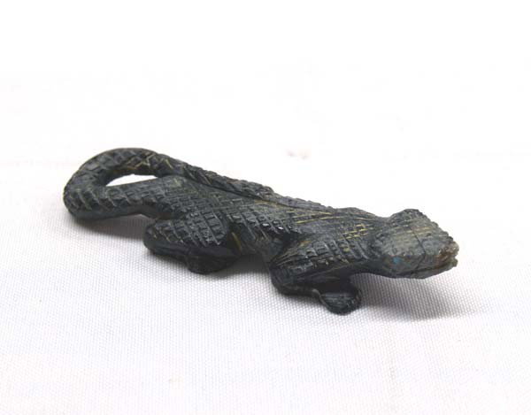 Native American Zuni Lizard Fetish By N Yatsattie: Native American Zuni Lizard Fetish By Nelson Yatsattie. Picasso marble. Measures approx. 2/3''H x 3 3/4''L x 1''W. Buyers Pay Actual Shipping and Handling Charges(see terms and conditions for more inf