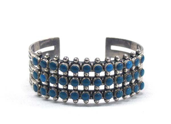 Native American Zuni Petit Point Bracelet: Native American Zuni Petit Point Silver Turquoise Bracelet, inside measures approx. 6'' x 1''W. Buyers Pay Actual Shipping and Handling Charges(see terms and conditions for more information).