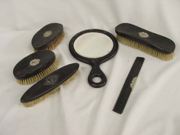 Antique Dressing Set In Original Box: Antique Dressing Set In Original Box. Five brushes, comb and hand mirror. The brushes are losing some bristles. Largest brush measures approx. 7 1/4'' long x 2'' wide. Box is damaged on the bottom. Bu