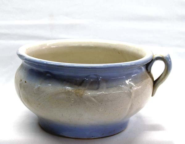 Antique Pottery Chamber Pot: Antique Pottery Chamber Pot, embossed bow on each side, measures approx. 5 3/8''H x 9.25''. Buyers Pay Actual Shipping and Handling Charges(see terms and conditions for more information).