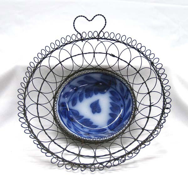 Antique Flow Blue Wire Basket Bowl: Antique Flow Blue Wire Basket Bowl, measures approx. 4.25''H x 10''diameter. Buyers Pay Actual Shipping and Handling Charges(see terms and conditions for more information).