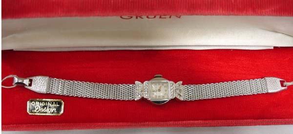 Ladies Gruen Silver Mesh Band Watch: Ladies Gruen Silver Mesh Band Watch. In original box and does work. Band measures 6.5'' long and 3/8'' wide. Buyers Pay Actual Shipping and Handling Charges(see terms and conditions for more informati
