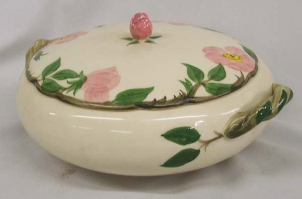 Franciscan Desert Rose Covered Casserole: Franciscan Desert Rose Covered Casserole. Measures approx. 5'' tall x 10''W (end of handles) x 1/2''W. Some chipping on top of the rose. Buyers Pay Actual Shipping and Handling Charges(see terms and c