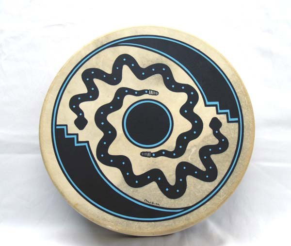 1991 Native American Taos Drum by Henry Samora: 1991 Native American Taos Drum by Henry Samora, signed inside of drum Henry Samora, leather wrist strap on back which reads All One Tribe Drum and also 1-800-442-DRUM Taos, New Mexico 1991 SW Producti