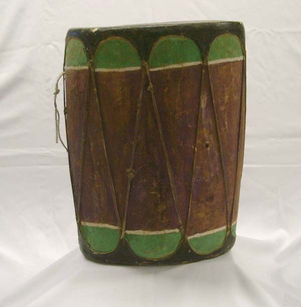 Native American Cochiti Antique Drum: Native American Cochiti Antique Drum, Mineral Painted, Rawhide Top & Bottom with Rawhide Covered Beater. Measures approx. 18''H 13'' x 9.5'' diameter. Buyers Pay Actual Shipping and Handling Charges(s