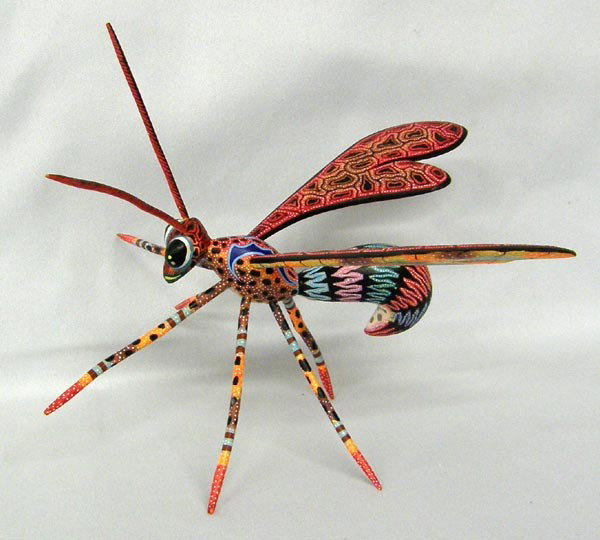 Oaxacan Winged Bug Alebrije signed Raul Blas: Oaxacan Winged Bug Alebrije signed Raul Blas. Measures approx. 4.75''Hx6.5''Lx6.5''W. Buyers Pay Actual Shipping and Handling Charges(see terms and conditions for more information).