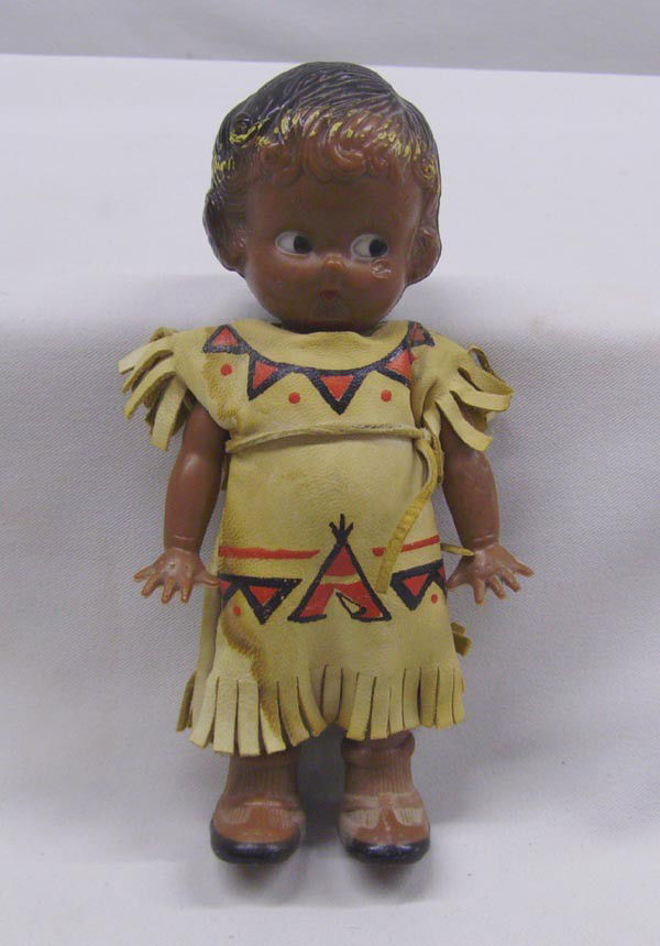 Vintage Googly Eyed Indian Doll: Antique Googly Eyed Indian Doll with painted leather dress. 6'' tall by 2.5'' wide. Arms will need to be re-attached. Buyers Pay Actual Shipping and Handling Charges(see terms and conditions for more