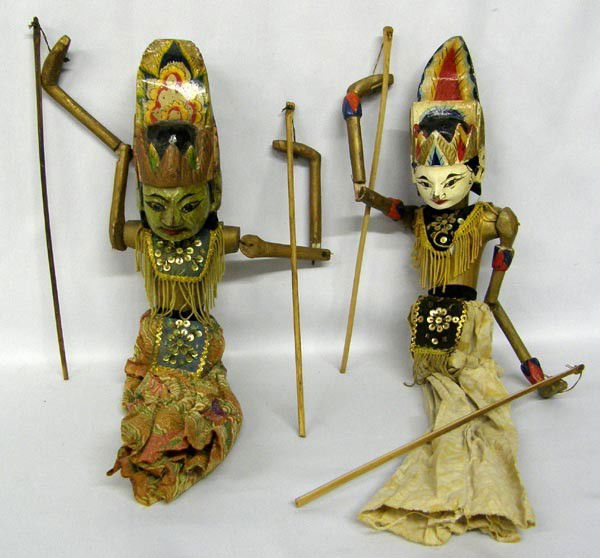2 Vintage Indonesian Stick Puppets: 2 Vintage Indonesian Stick Puppets. Removable wood heads. Heads measure approx. 6'' x 6'' x 2 1/2'', top of body to end of stick measures approx. 22''. Buyers Pay Actual Shipping and Handling Charges(