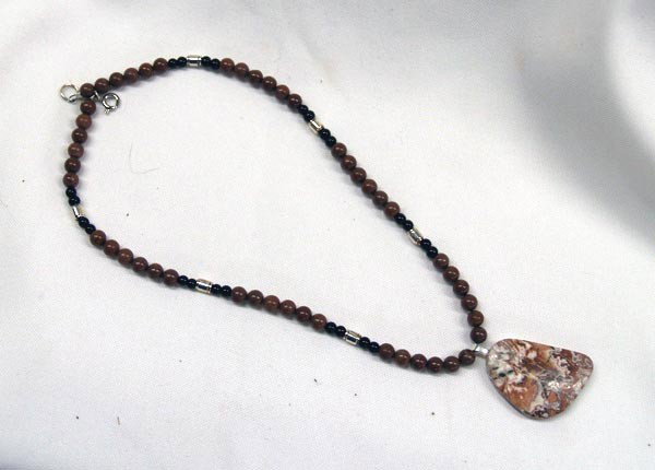 Mexican Crazy Lace Agate Necklace by Sally Hansen: Stunning, One of Kind Mexican Crazy Lace Agate Pendant Necklace by Sally Hansen, local Silver City, NM artist, she hand cuts and polishes her own stones and does all of her own silverwork, necklace ha