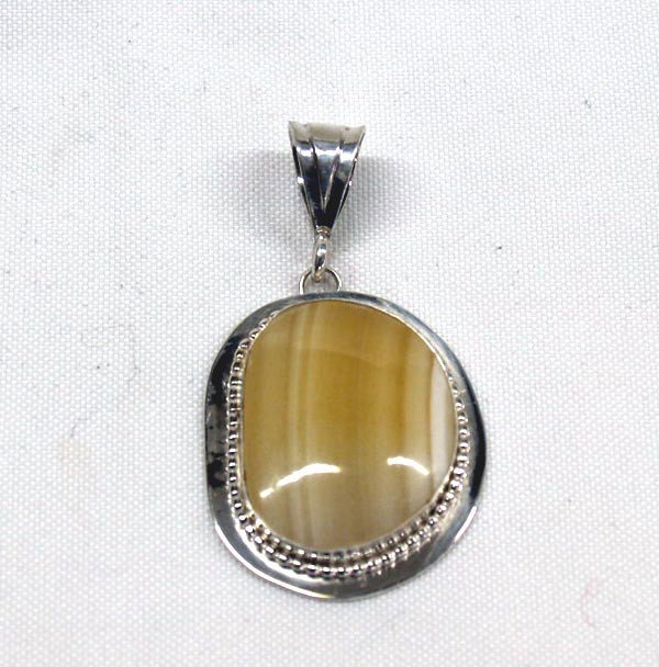 Sterling Silver Honey Onyx Pendant by Sally Hansen: Stunning, One of Kind Honey Onyx & Sterling Pendant by Sally Hansen, local Silver City, NM artist, she hand cuts and polishes her own stones and does all of her own silverwork, measures approx. 2 3/8'