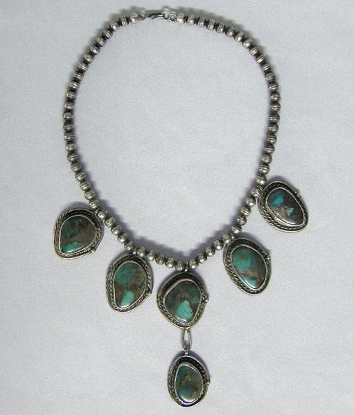 Native American Navajo Turquoise Silver Choker: Native American Navajo Bisbee Turquoise Silver Choker. Hand tooled beads. Pendant is 3.25''H x 1.25''W. 15'' end to end. Buyers Pay Actual Shipping and Handling Charges(see terms and conditions for mo