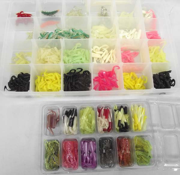 Soft Plastic Fishing Lures Bait: Collection of Soft Plastic Fishing Lure Bait. All different colors, largest measures approx. 1 3/4'' long. In plastic containers. Buyers Pay Actual Shipping and Handling Charges(see terms and conditio
