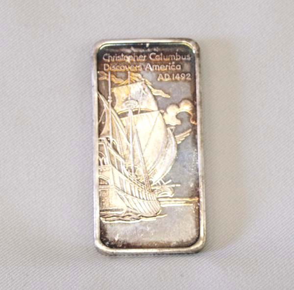 One Troy Silver Ounce Ingot Christopher Columbus: One Troy Silver Ounce Ingot ''Christopher Columbus Discovers America AD 1492'' marked on front and ''Historical Events One Troy Oz .999 Fine Silver'' marked on back of ingot. Buyers Pay Actual Shippin