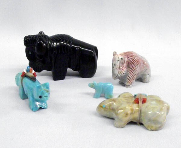 Native American Zuni Fetishes: 5 Native American Zuni Fetishes. 1 Jet Bison with turquoise eyes, measures approx. 1.5''H x 2.5''L. Very Small Bead Bear Fetish, Turquoise fox with an abalone on his powerpack and has a chip out of th