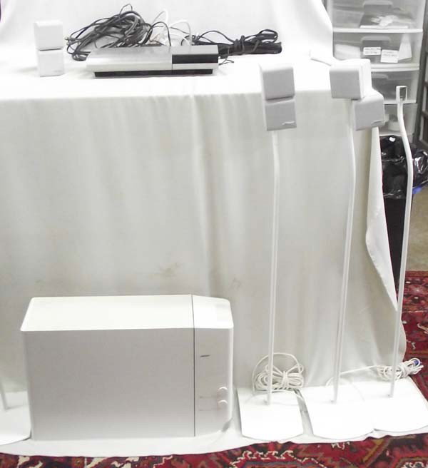 Bose 6 Disc CD Player and Speaker System: Bose 6 Disc CD Player and Speaker System. The CD player is a Bose 1998 Lifestyle Music System, Model 20 Music Center. Measures 15.5''Wx8.5''Dx2.75''H. The Bose Acoustic IMASS System, ''Lifestyle 25 Po
