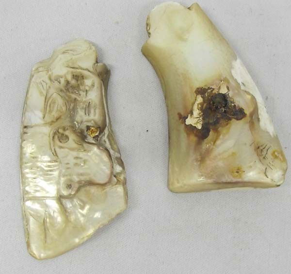 Vintage Carved Mother of Pearl S&W Pistol Grips: Vintage Carved Mother of Pearl Smith & Wesson Pistol Grips, carved steer's head on one, measures approx. 3'' x 1.5''. Turn of the Century grips from a hand ejector model hand gun. Buyers Pay Actual Sh