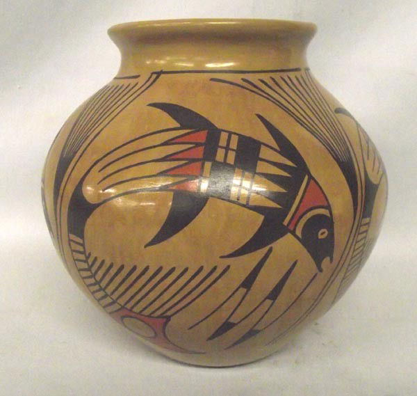 Mata Ortiz Polychrome Pottery by Jesus Tena: Mata Ortiz Polychrome Fish Design Pot by Jesus Tena, measures approx. 8''H x 8''Diameter. Buyers Pay Actual Shipping and Handling Charges(see terms and conditions for more information)