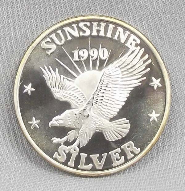 1990 One Troy Ounce Silver Coin Sunshine Mining: 1999 One Troy Ounce Silver Coin Sunshine Mining, marked .999 fine silver Buyers Pay Actual Shipping and Handling Charges(see terms and conditions for more information)
