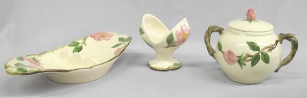 Collection of Franciscan Desert Rose Tableware: Collection of Franciscan Desert Rose Tableware to include: 1 candleholder (very small nip on rim), 1 sugar bowl with lid (2 chips on rim), and 1 ashtray, largest piece (ashtray) measures approx. 1.5''