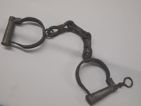 Antique Iron Handcuffs With Key: Antique Iron Handcuffs With Key. Irons measure 16'' long x 3.5'' wide. Buyers Pay Actual Shipping and Handling Charges(see terms and conditions for more information).