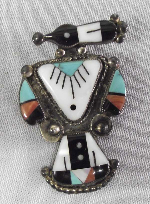 Vintage Navajo Thunderbird Pin: Vintage Native American Navajo Silver Stone to Stone Inlay Thunderbird Pin, turquoise, MOP, coral, jet, and abalone. Measures approx. 2''H x 1 1/3''w. Buyers Pay Actual Shipping and Handling Charges(s