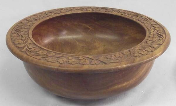 Carved Rosewood Bowl: Detailed carving in the rosewood, purchased in Saudi Arabia. Measures 11'' x 3 1/4''. Buyers Pay Actual Shipping and Handling Charges(see terms and conditions for more information)