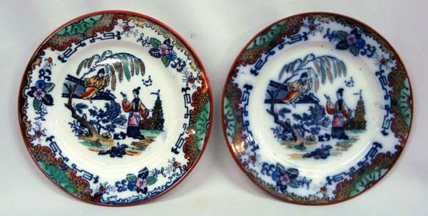 Antique Flow Blue Keller & Guerin Plates/2 "Timor" : Antique Flow Blue Porcelian Plates made by Keller & Guerin, Luneville, France, ca. 1889, marked "KG", the pattern is "Timor", measuring approx. 8'' diameter. Buyers Pay Actual Shipping and Handling Ch