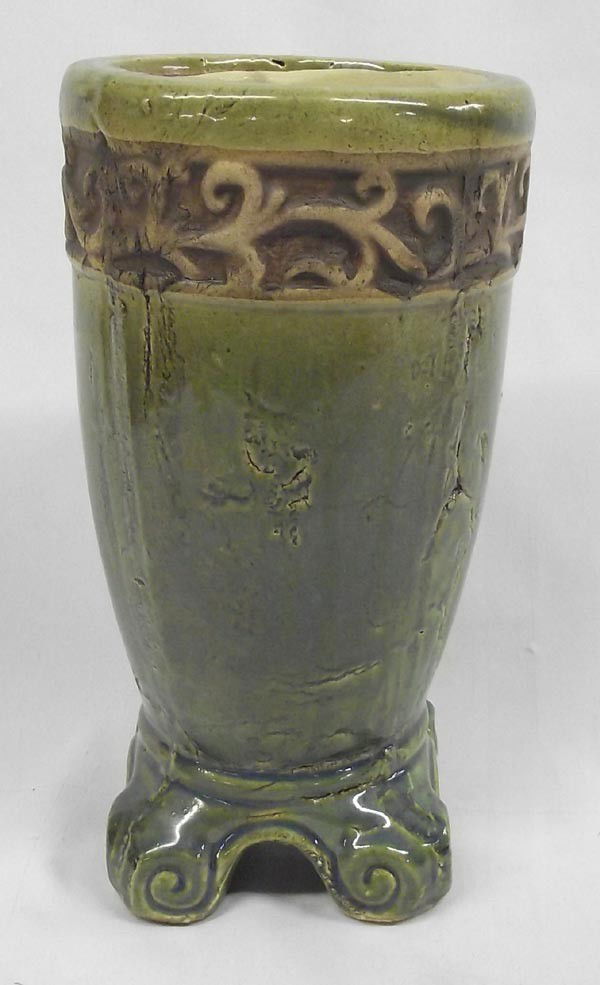 Chinese Earthenware Footed Vase: Chinese Earthenware Footed Vase, celedon type high fire glaze with pattern banding near the top in tan. Measures approx. 9.25''H x 5.25''Diameter. Rustic appearance, heavy, likely Chinese earthenware.