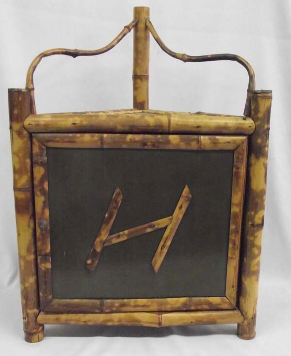 English Bamboo Corner Hanging Shelf: English Bamboo Corner Hanging Shelf for knick knacks. Older piece. Measures approx. 23''H x 16 1/2'W x 8 1/2''D. Buyers Pay Actual Shipping and Handling Charges(see terms and conditions for more infor