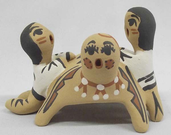Jemez Folk Art Turtle with Children Pottery - Fragua: Native American Jemez Hand-Crafted traditional pottery by Bonny Fragua. Two Children trying to ride the back of a turtle, signed B.F. Jemez. Bonnie hand gathers her own clay and fires it in the tradit