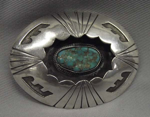 1950 Navajo Sterling Turquoise Belt Buckle: 1950 Native American Navajo Sterling Silver Turquoise Shadow Box Belt Buckle signed on the back P. Williams. The Hallmark of the artist is a W with a flower, see picture. Measures approx. 3 3/4'' x 2 