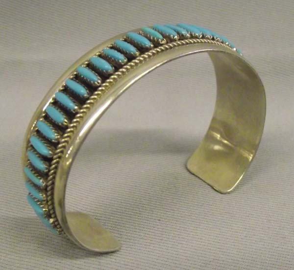 Zuni Sterling Petit Point Turquoise Bracelet: Native American Zuni Sterling and Petit Point Turquoise Bracelet-Hallmark RB. Measures 7'' inside including opening x 0.75''w. Stamped on inside, ''RB Sterling'' for Robert Becenti. Buyers Pay Actual 