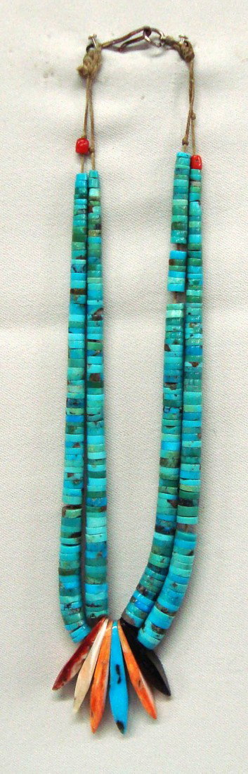 1940's Santo Domingo Turquoise Jockla Choker: Native American,1940's Santo Domingo, stacked turquoise heishi jockla choker with shell, turquoise and onyx, fan-shaped pendant stones. Strung on string, end to end 14''. 1.50'' x 1'' pendant fan. Buy