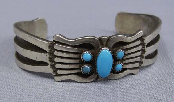 Navajo Sterling Silver Turquoise Bracelet - Martinez: Native American Navajo Sterling Silver Bracelet by Rick Martinez. Heaving sterling silver, set with Sleeping Beauty turquoise. Inside measurement approx. 7'', includes 1.4'' opening. Signed by the art