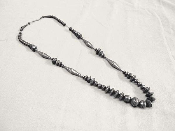 Antique Navajo Sterling Hollow Bead Necklace: Antique Native American Navajo Sterling Silver Hollow Bead Necklace. Strung on chain. Measures end to end approx. 31''. Buyers Pay Actual Shipping and Handling Charges(see terms and conditions for mor