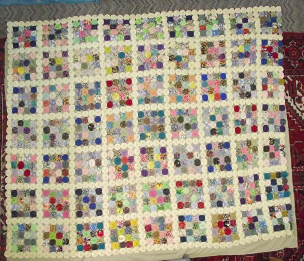 Vintage Yo-Yo Coverlet, Depression Era: Vintage Yo-Yo Coverlet, Depression Era fabrics. Coverlet measures approx. 80'' x 100''. Yo-yos are 2'' across. Some early re-attachments of pieces are noted. Buyers Pay Actual Shipping and Handling Ch
