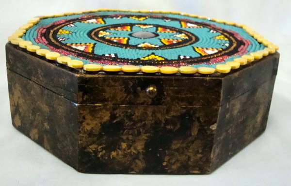 Hand Beaded Wooden Box by Artist Kills Thunder: Octagonal wooden box beaded top by Kills Thunder. 10'' diameter. Clean unscratched wood inside. Small chip in paint on the front edge. Buyers Pay Actual Shipping and Handling Charges(see terms and con