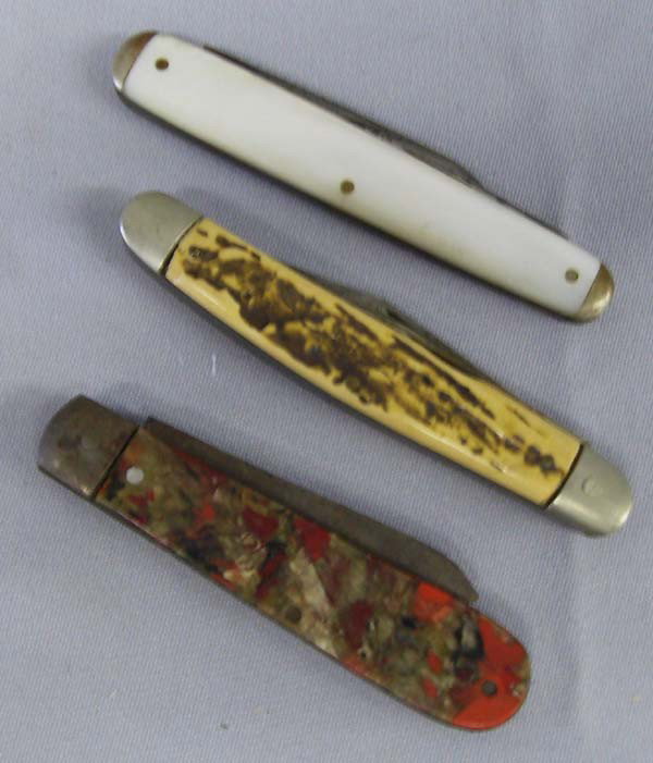 Vintage Pocket Knives/3 Pieces: Vintage Pocket Knives/3 Pieces. 1 ''Challenge'' mother-of-pearl case, 2 blades, measures 3 3/8'', second knife is unmarked with 2 blades, knife combo/bottle opener and screwdriver with composition mar