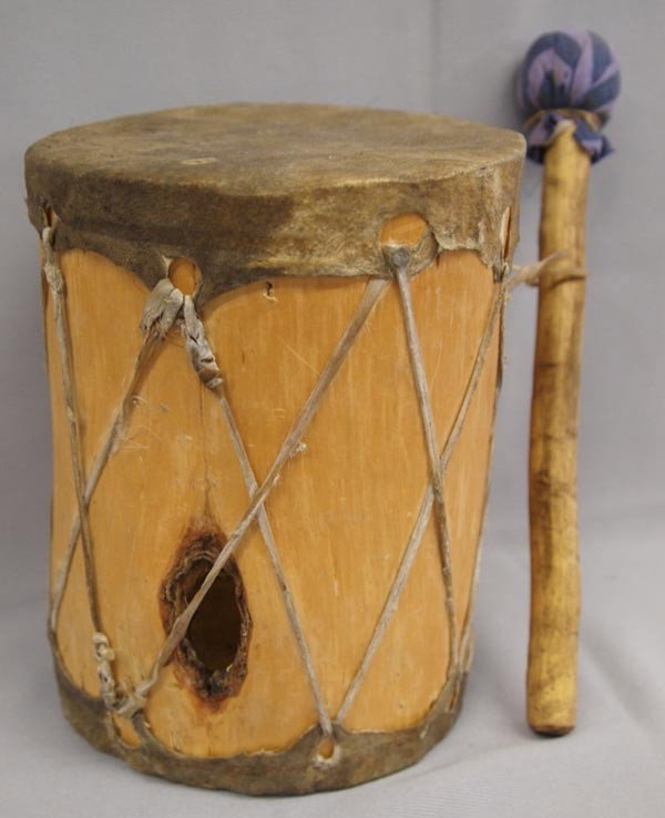 New Mexico Pueblo Drum and Beater: New Mexico Pueblo Drum. Rawhide and wood drum with beater. Measures 7''Hx5.5''W. Buyers Pay Actual Shipping and Handling Charges(see terms and conditions for more information).