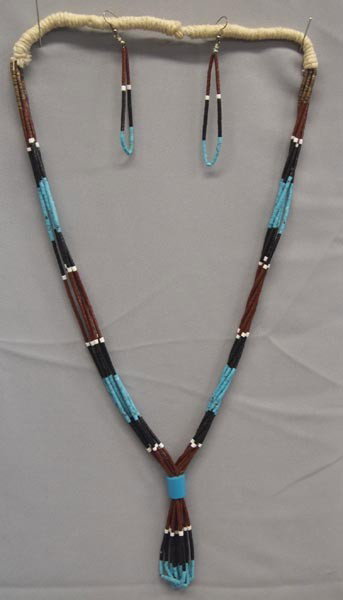 Santo Domingo 6 Strand Necklace & Earrings: Native American Santo Domingo 6 Strand Necklace & Earrings. Jet, pipestone, and turquoise beads. Necklace is string tied and measures 29'' around neck plus has a 3'' drop below the blue bead that clas