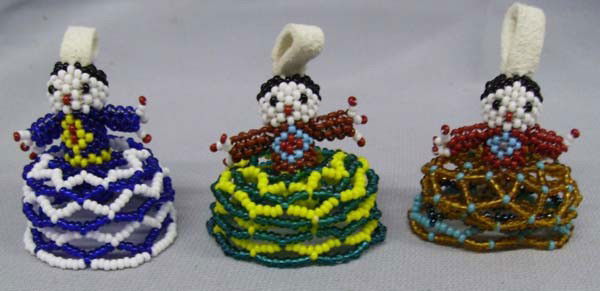 3 Zuni Miniature Beaded Dolls: 3 Native American Zuni Miniature Beaded Dolls. Largest measures approx. 1 1/2'' tall. Buyers Pay Actual Shipping and Handling Charges(see terms and conditions for more information).