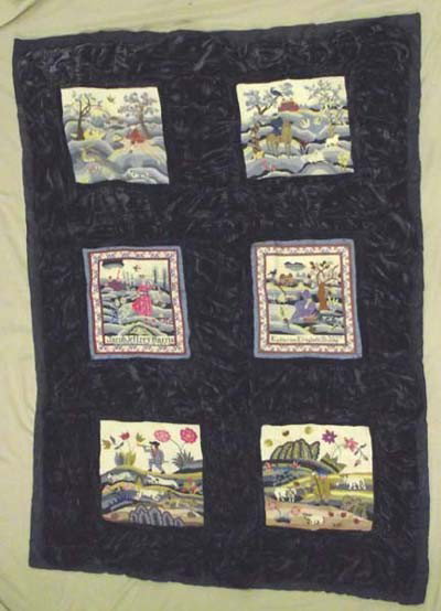 Estate Childs Needlepoint Crushed Velvet Quilt: Las Cruces Needlepoint Crushed Velvet Quilt. Six 10'' x 10'' needlepoint panels. The needlepoint work is framed in gathered dark blue crushed velvet. Reverse side is machine embroidered crazy quilt wi