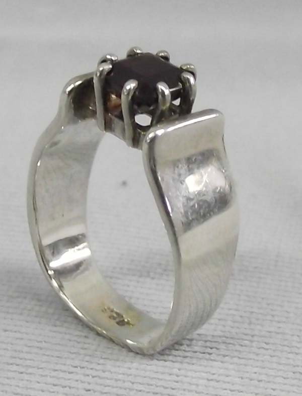 Cherokee Sterling Silver Garnet Ring: Native American Cherokee Sterling Silver Garnet Ring. Crafted by Cherokee artist, MS. Size 6 ring. Garnet is 1/4'' diameter. Buyers Pay Actual Shipping and Handling Charges(see terms and conditions fo