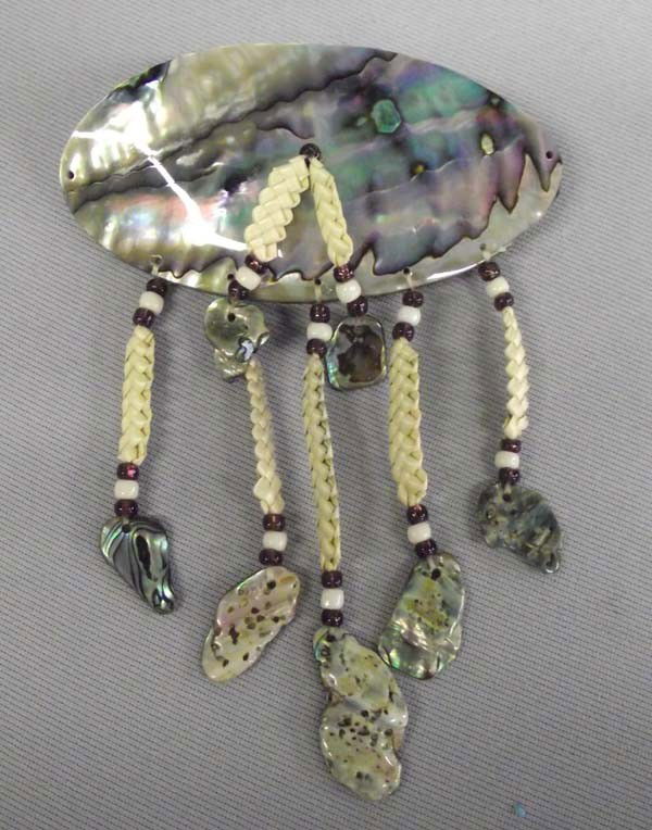 California Abalone Barrette: California Abalone Barrette. Barrette measures approx. 2''H x 4''L. Buyers Pay Actual Shipping and Handling Charges(see terms and conditions for more information).