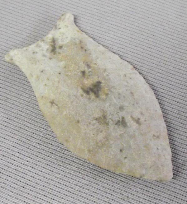 Classic Stone Arrowhead: Classic Stone Arrowhead. Age and origin unknown. Measures approx. 2 1/4''L. Buyers Pay Actual Shipping and Handling Charges(see terms and conditions for more information).