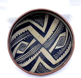 Prehistoric Gila Black on Tan Geometric Bowl: Prehistoric Gila Geometric Bowl. Black on tan inside and red outside bowl with small area of paint loss, as found condition. No restoration or glue. Measures 5''x9.25''. This item is from the Arthur P