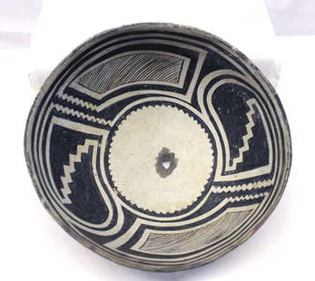 Prehistoric Classic Mimbres Geometric Bowl: Prehistoric Native American Classic Mimbres Geometric Bowl. Very unusual black on white negative geometric pattern inside bowl. Flowers and lightening. Different patterns on each quadrant. Measures 5'