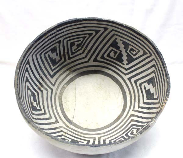 Prehistoric Mesa Verde Black on White Bowl: Native American Prehistoric Mesa Verde Black on White Geometric Bowl. Geometric maze bowl. It has been broken and glued. Measures 5.25''x10''. This item is from the Arthur P. Zeitling estate. Acquisit